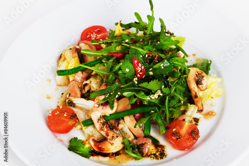 Food arugula salad with mushrooms and cherry tomatoes chicken 