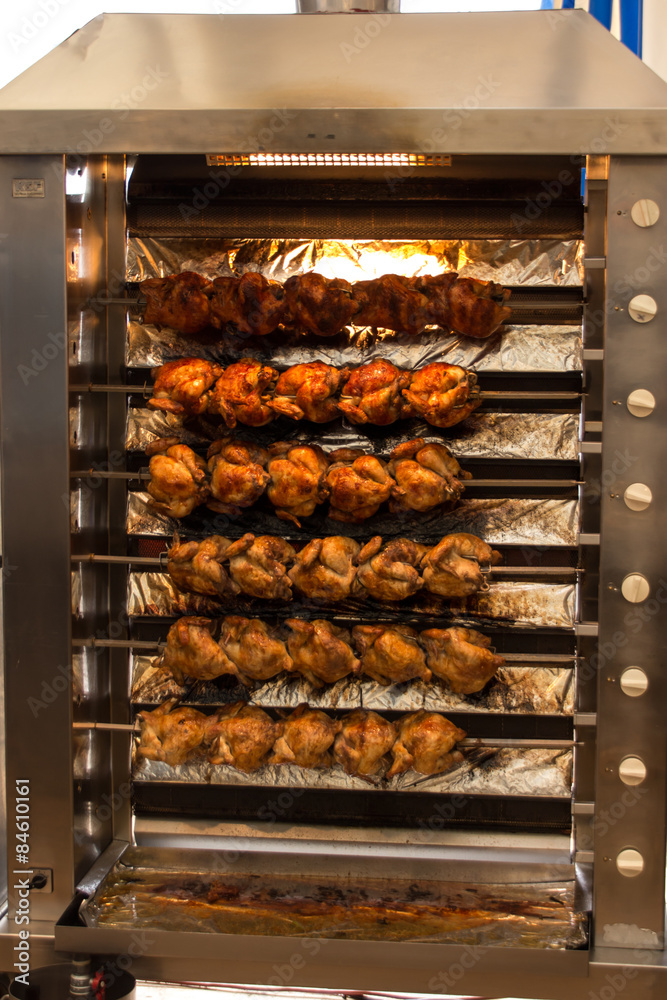 Broiled chicken at festival on Theresienwiese in Munich, 2015