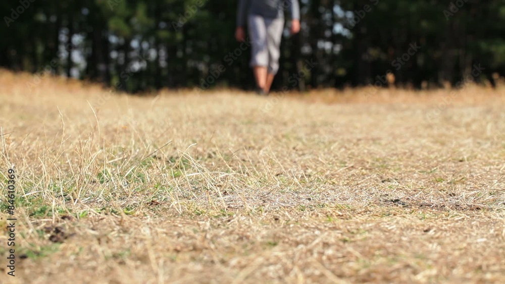 Man hiking - trekking outdoors at sunny day Man hiking - trekking outdoors at sunny day