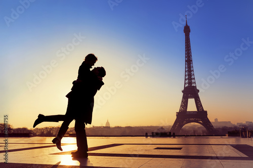 Young couple in love at Eiffel Tower © NicoElNino