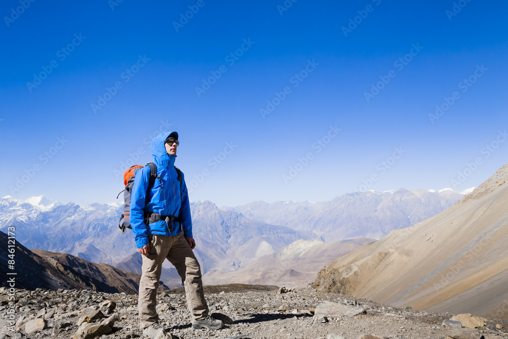 Hiker in high Himalaya mountains