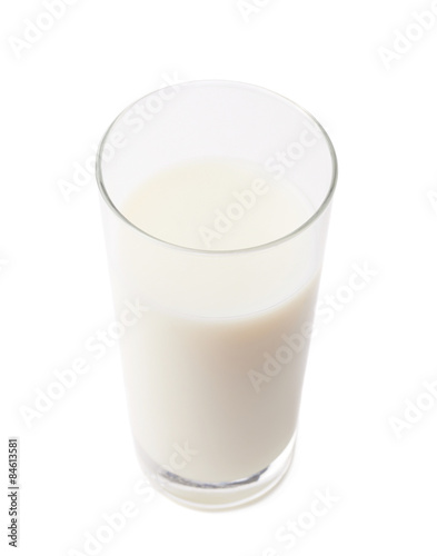Tall glass of milk isolated