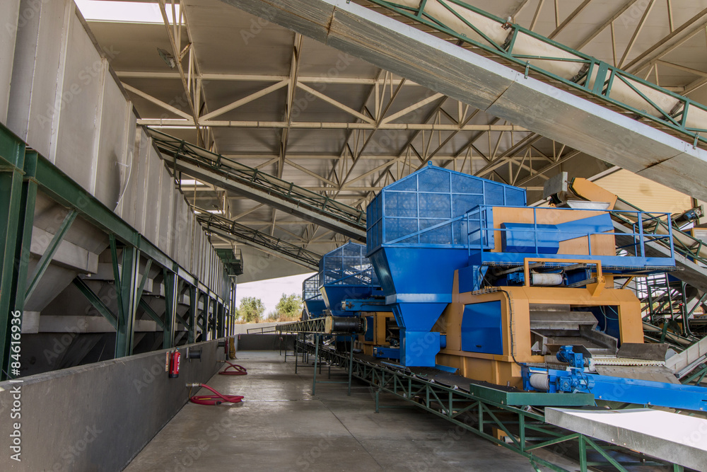 View of a modern processing unit machinery for olive oil. View of a modern processing unit machinery for olive oil.