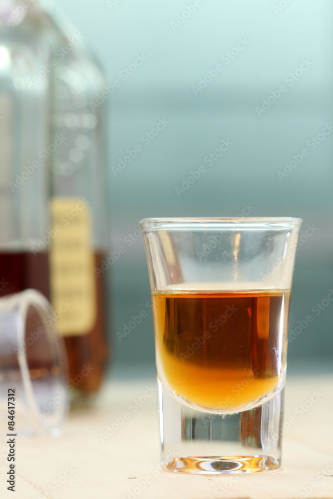 Close up glass of brandy on wood table. Close up glass of brandy on wood table.