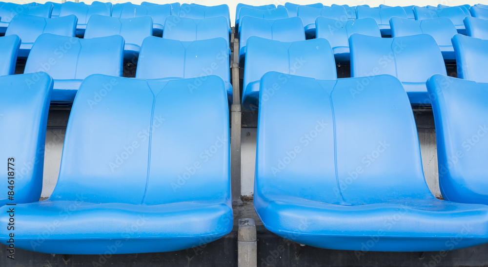 Obraz premium Empty blue seats or chair rows in stadium