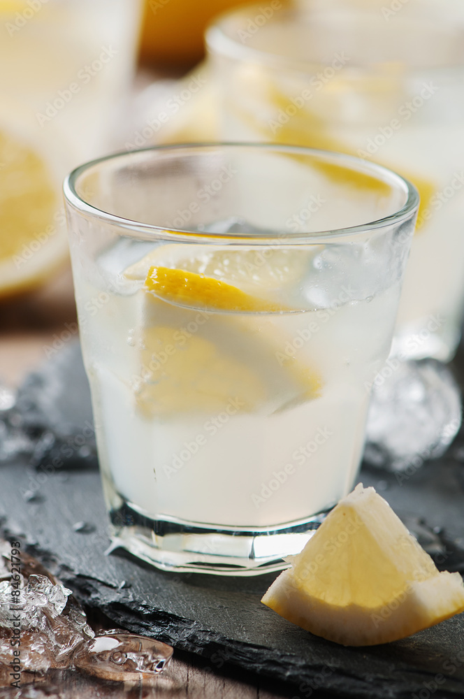 Homemade lemonade with lemon and ice Homemade lemonade with lemon and ice