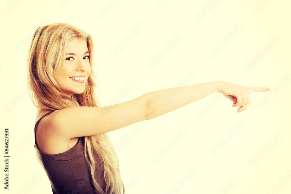 Student woman pointing to the right Student woman pointing to the right