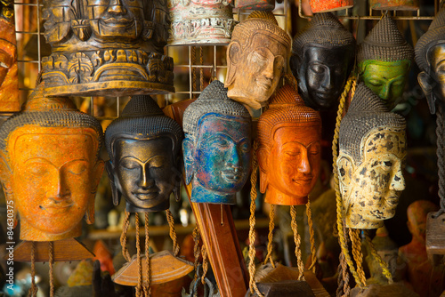 Mask of the Buddha,market on the street. Cambodia, Phnom Penh photo