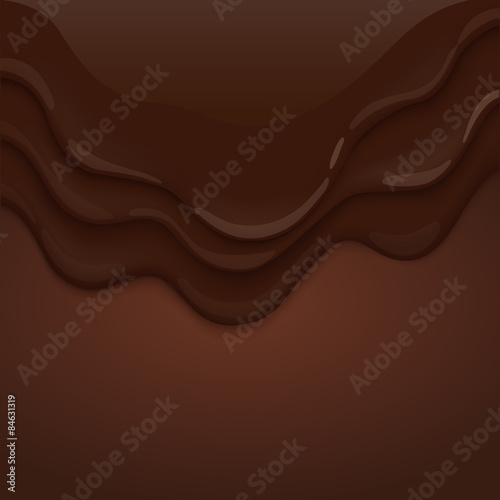 Chocolate is flowing down on brown background