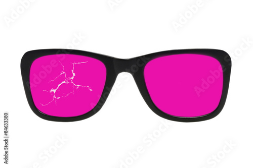 Broken pink glasses.
