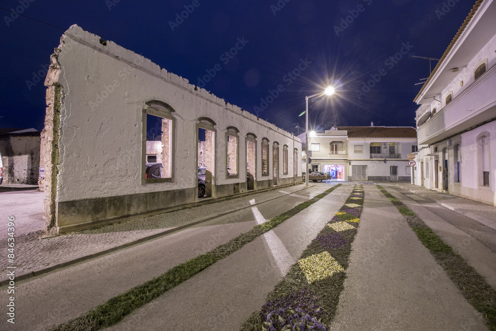 SAO BRAS DE ALPORTEL, PORTUGAL - April, 2015: Traditional religious procession of the flower torches event located in village of Sao Bras de Alportel, Portugal.