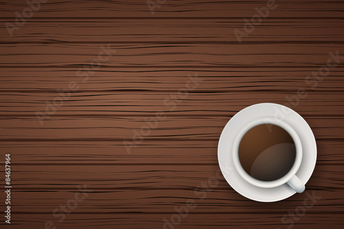 Cup of coffee or tea on the table dark wood