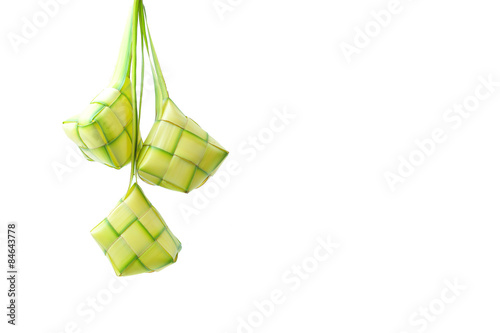 A diamond Ketupat shaped a natural rice casing made from young coconut leaves for cooking rice on white background
