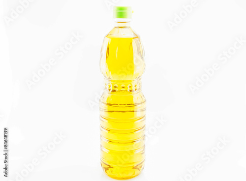 Bottle of vegetable oil for cooking isolated on white background with clipping path