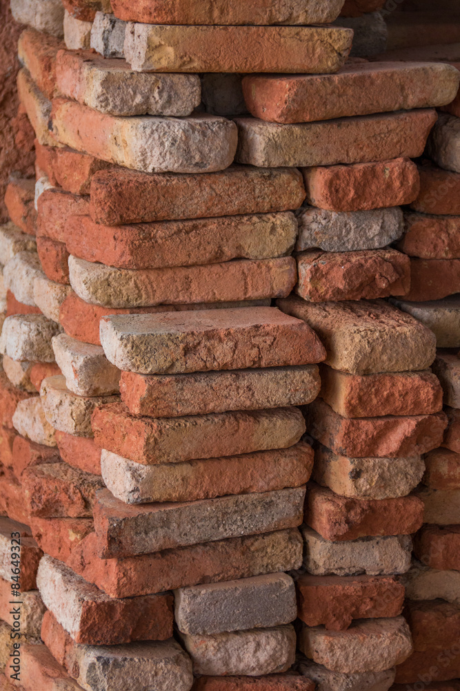 Close view of a pile of traditional mud bricks production. Close view of a pile of traditional mud bricks production.