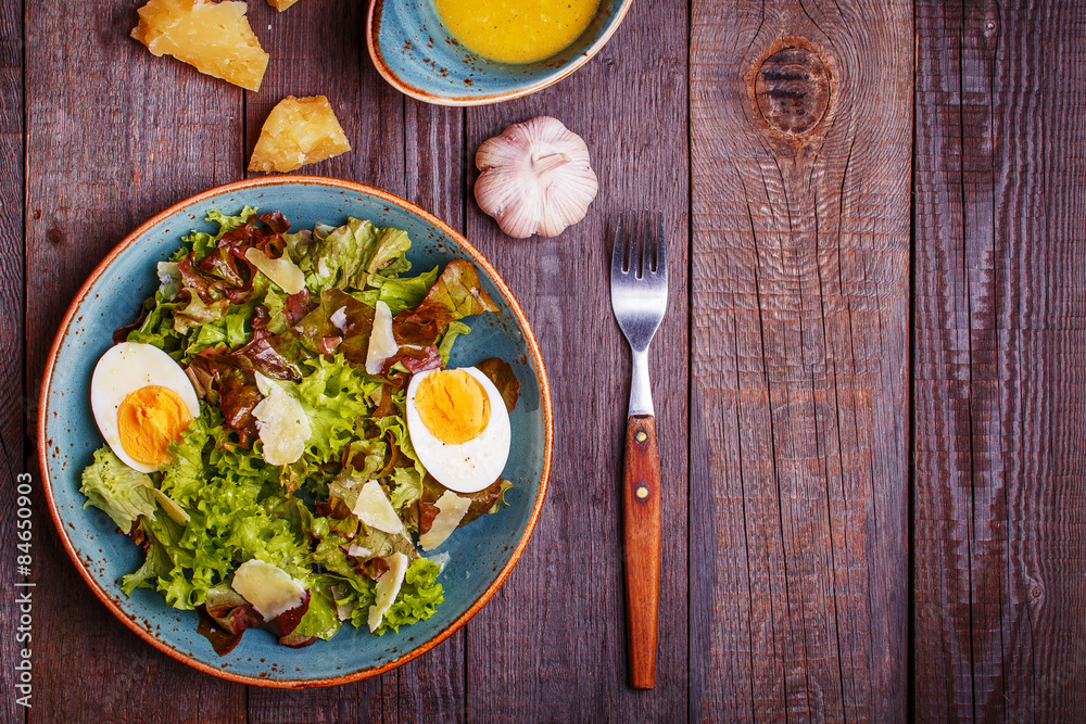 Fresh salad with egg and parmesan cheese Fresh salad with egg and parmesan cheese