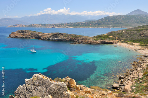 vue de la péninsule de la Levellata sur mer turquoise et Calvi - Corse
