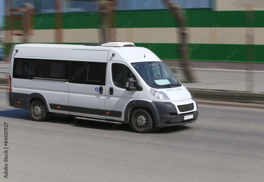 minibus goes on the city street minibus goes on the city street