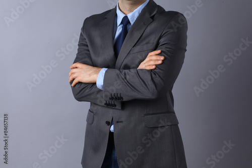 Businessman standing with arms crossed