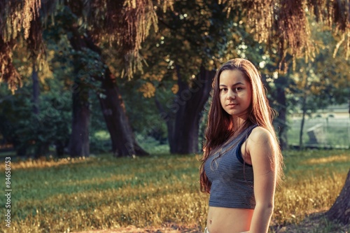 Beautiful teenage girl in a park - summer concept