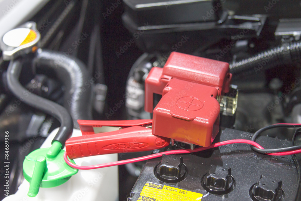 battery clamped with battery jumper to recharge the power battery clamped with battery jumper to recharge the power