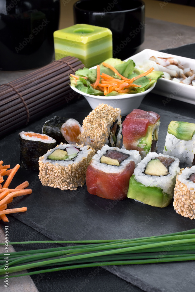 detail sushi rolls prepared on plate / sushi menu on restaurant detail sushi rolls prepared on plate / sushi menu on restaurant