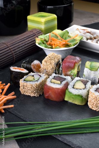 detail sushi rolls prepared on plate   sushi menu on restaurant