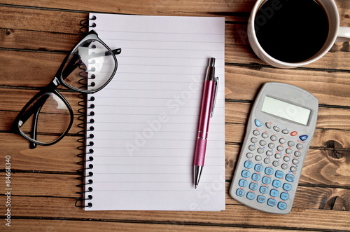 Notebook with office utensil