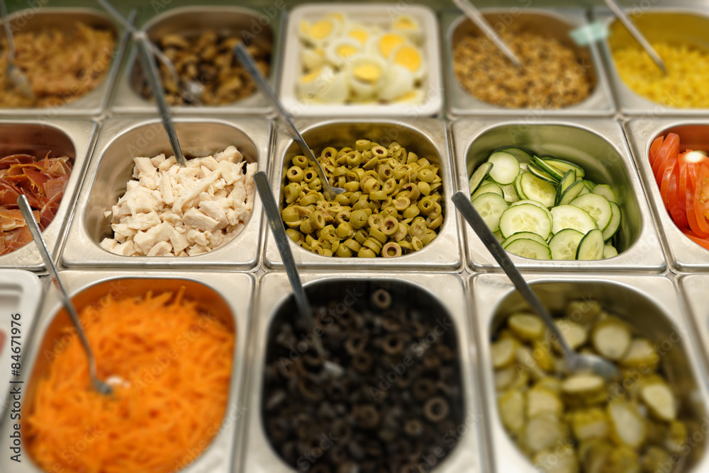 Fresh fast food in trays prepared for quick meal in a fast food restaurant with selective focus Fresh fast food in trays prepared for quick meal in a fast food restaurant with selective focus