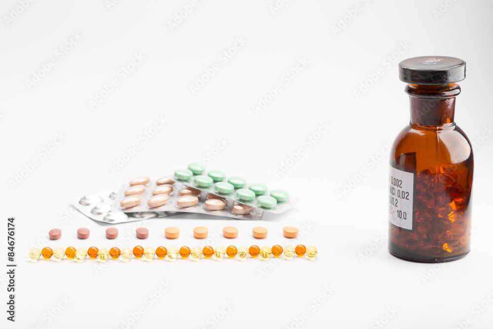 Bottle with pills on white Bottle with pills on white