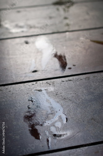 Photography Water footprint on wooden planks