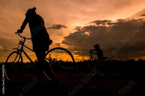 silhouette of woman and child