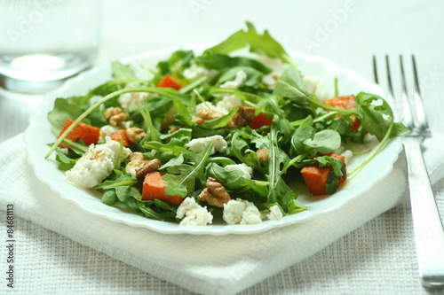 Ruccola salad with baked pumkin and goat cheese