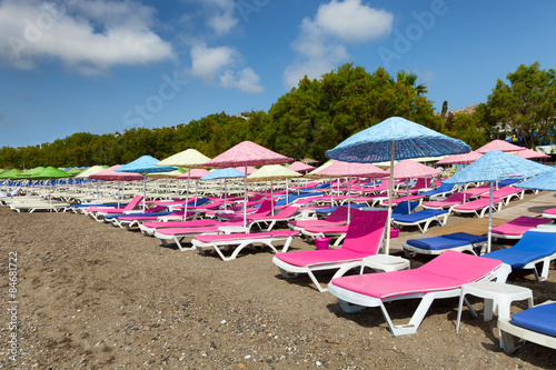 colorfun beach umbrella and sunbed photo