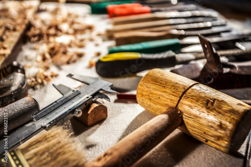 carpenter tools on wooden board