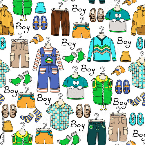 Vector seamless pattern with hand drawn and fashionable clothes for little boys on white color. Background for use in design, web site, packing, textile, fabric