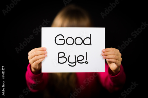 Child holding Good Bye sign