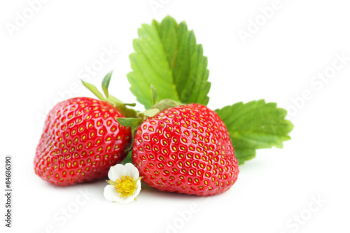 Strawberries berries with leaves isolated on white