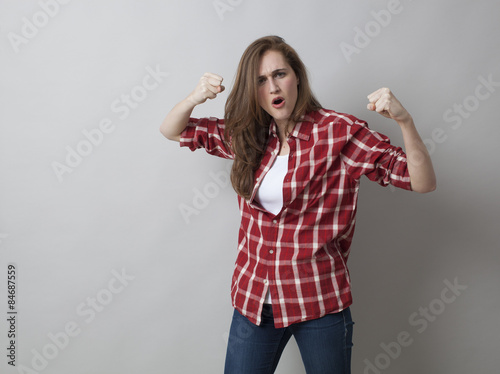 Slika na platnu 20s girl wanting to fight or to defend herself with self-assurance