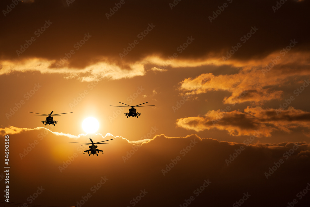 Group combat helicopters, Mi-24, Mi-8, warm sunset Group combat helicopters, Mi-24, Mi-8, warm sunset
