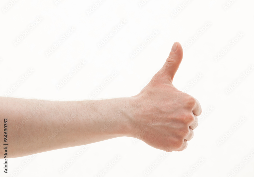 Male hand showing thumb up sign