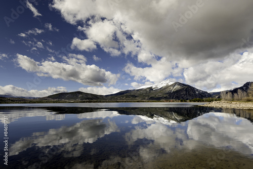 Fototapeta Naklejka Na Ścianę i Meble -  Clouds reflection in a still water lake