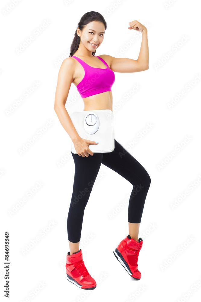 happy Young woman holding the weight scale happy Young woman holding the weight scale