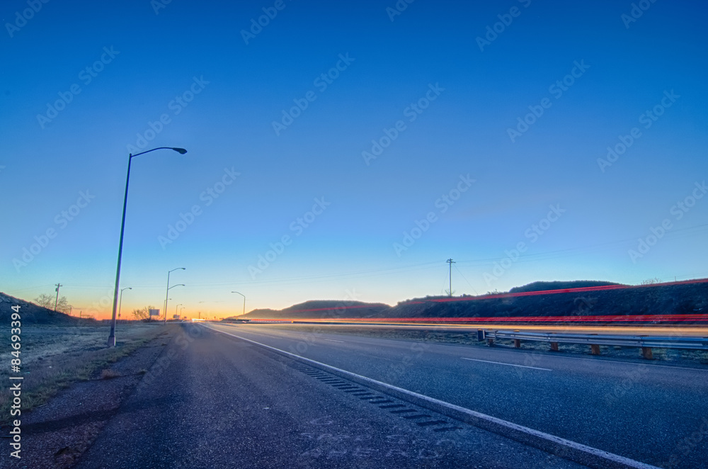 early orning travel on highway before sunrise