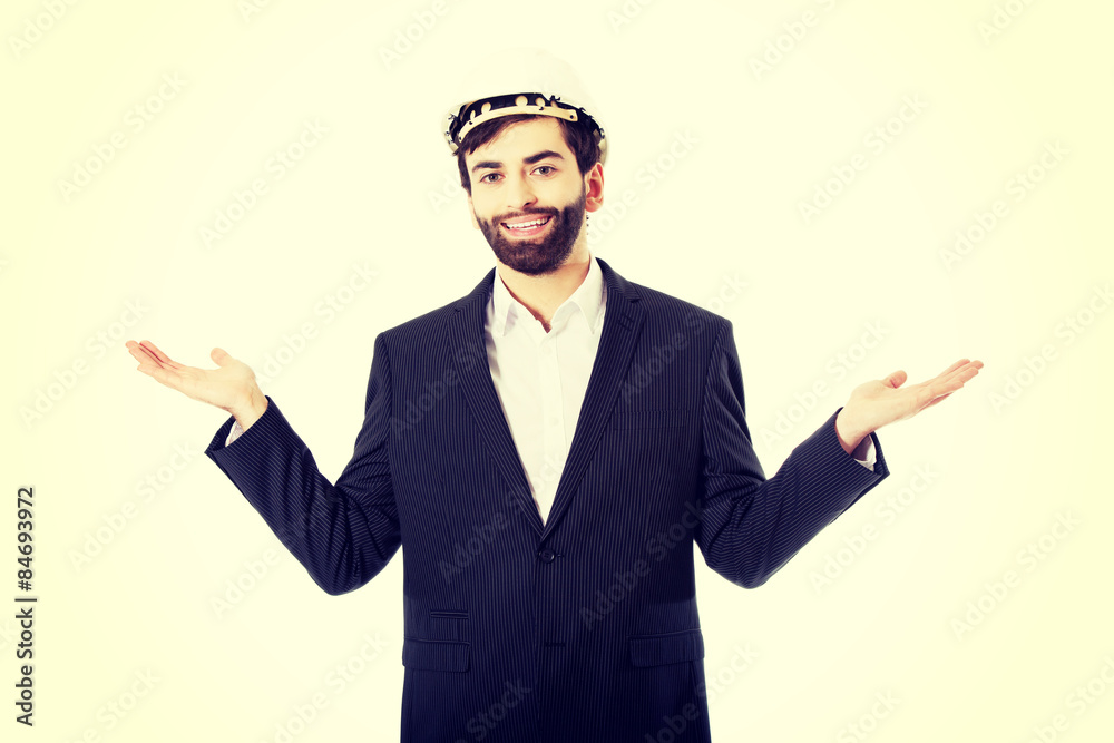 Businessman showing empty copyspace in hands. Businessman showing empty copyspace in hands.
