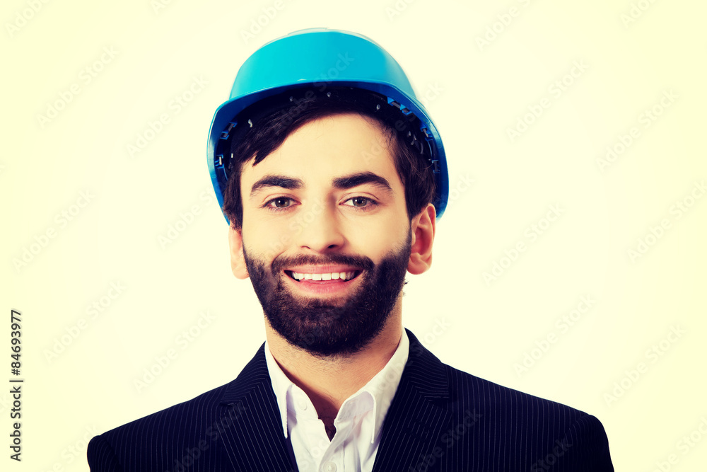 Handsome engineer in protective helmet. Handsome engineer in protective helmet.