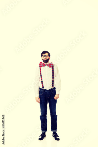 Old fashioned man wearing suspenders.
