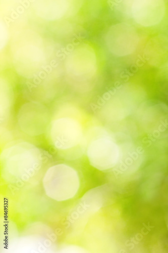 Abstract bright blurred yellow and green background