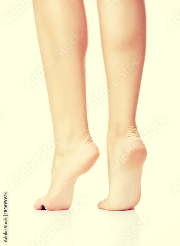Back view of beautiful slim female legs