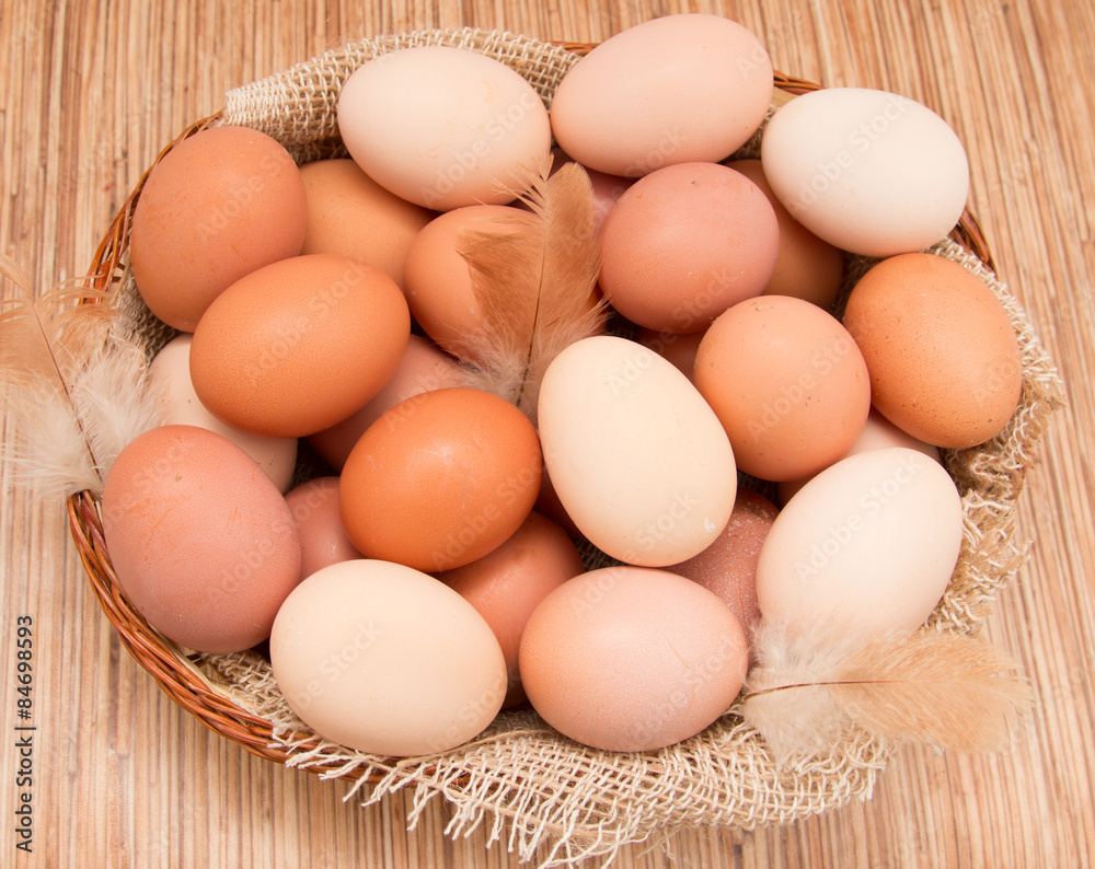 Fresh chicken eggs in a basket Fresh chicken eggs in a basket